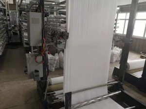 Ultrasonic fabric cutter for circular weaving loom